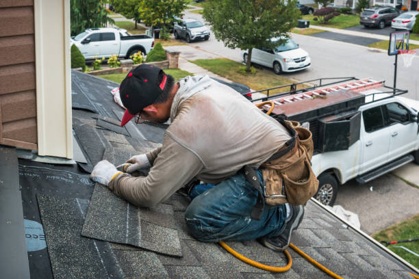 Professional Roofing technician working in Milan, IN